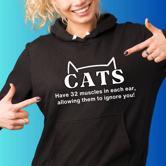 Hooded Sweatshirt-Funny Hoodie For Cat Lovers-With its playful design and witty slogan, this high-quality unisex hoodie is perfect for cat enthusiasts who appreciate the art of selective listening. Treat yourself today or bring joy to a fellow cat mom or dad with a thoughtful gift!  50% cotton, 50% polyester Classic fit Runs true to size Text: Cats have 32 muscles in each ear, allowing them to ignore you!