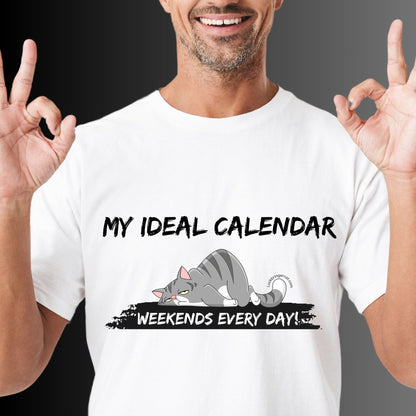 Funny Cat Dad Cat Mom Shirt- Unisex-This tee is not only perfect for cat lovers but also for everyone who craves the freedom to live life on their own terms.  Ideal Christmas or Birthday gift for everyone. text on the shirt: my ideal calendar, weekends every day; with a sleepy cat graphic 